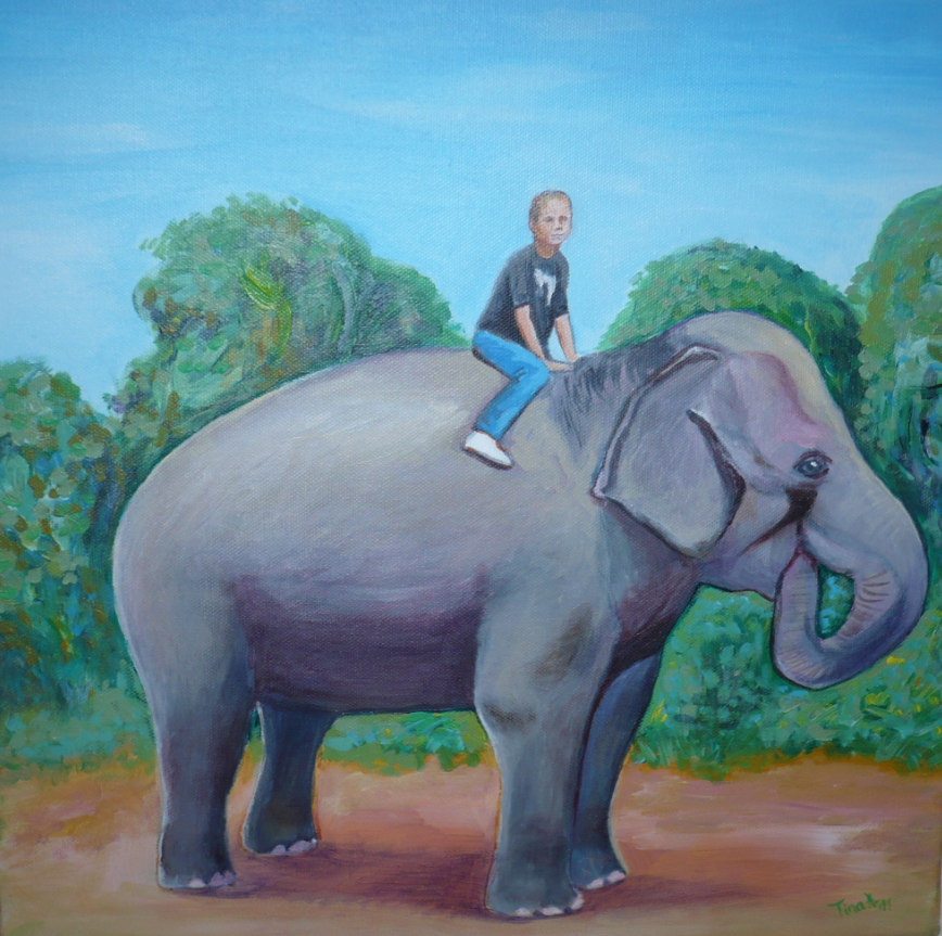 Kind auf Elefant